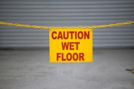 wet floor sign and barrier