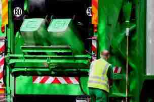 Truck and Operator Collecting Wheelie bins