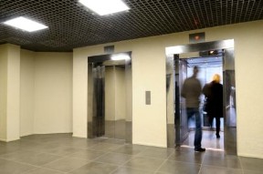 people entering a lift